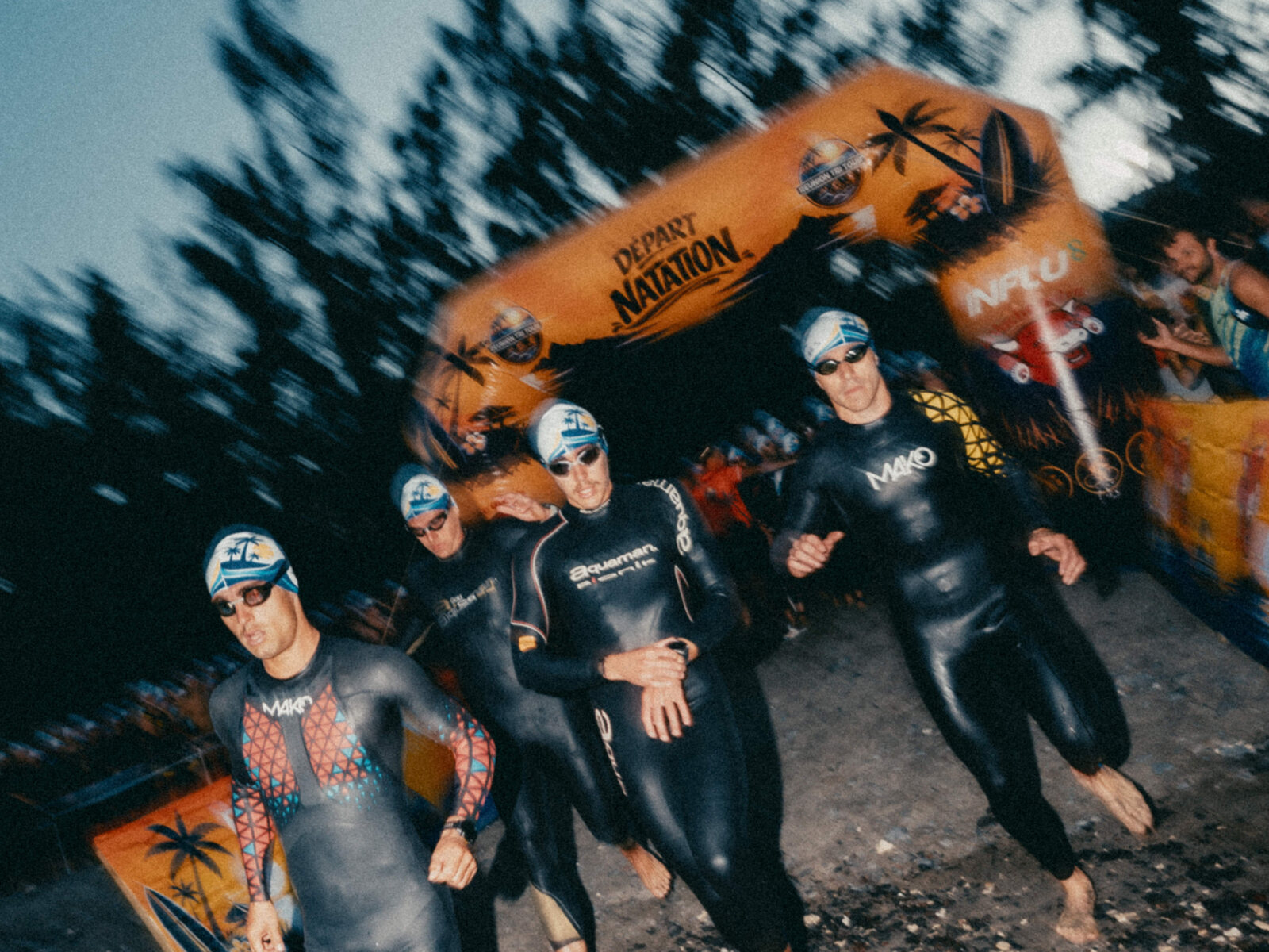 Entrée dans l'eau au départ de la natation